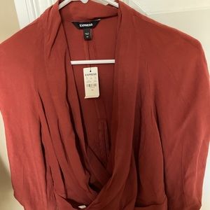 Express NWT size XS blouse rust cross front zip back pouf sleeve defined cuff